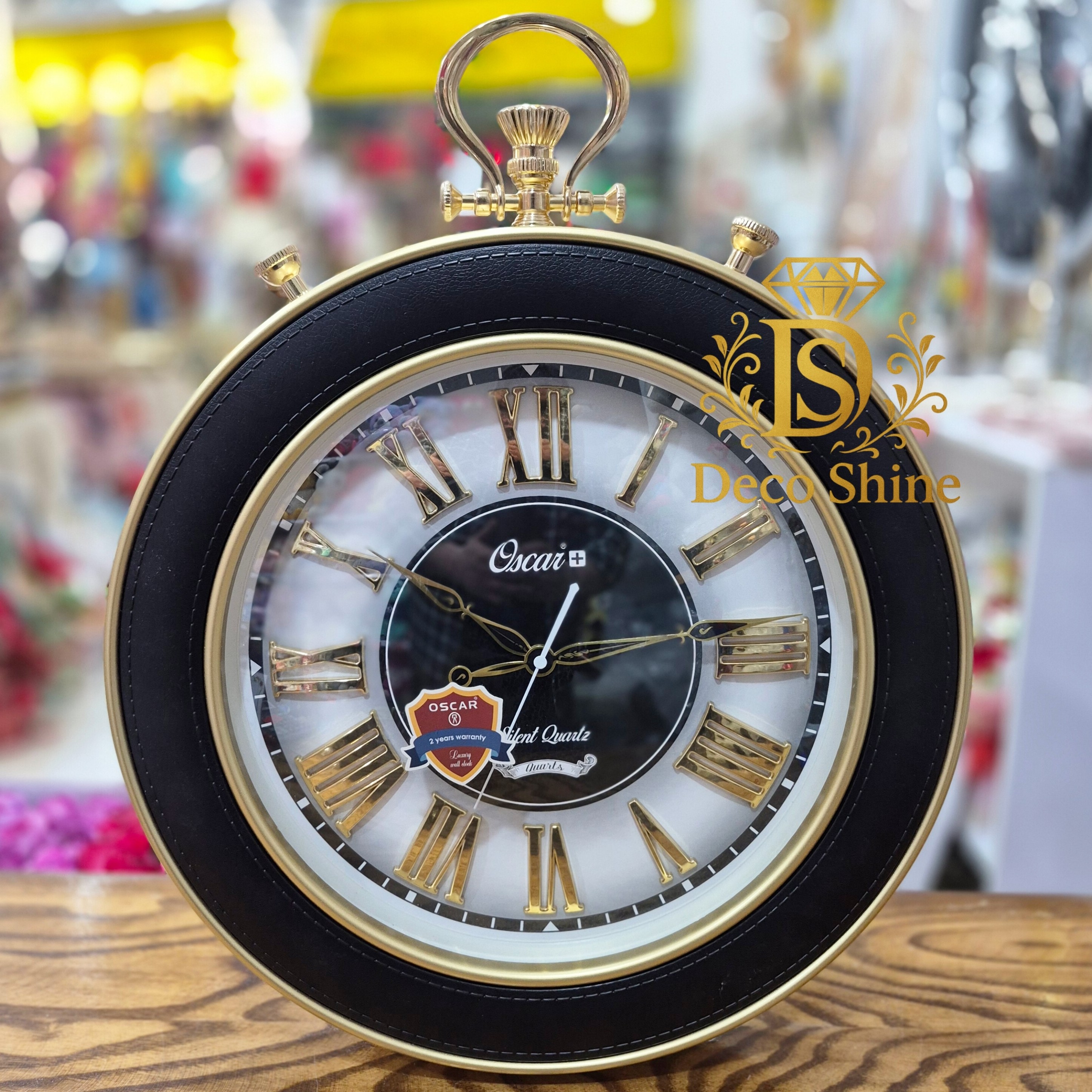 ساعت دیواری اسکار پلاس مشکی طلایی (اعداد رومی) بی صدا