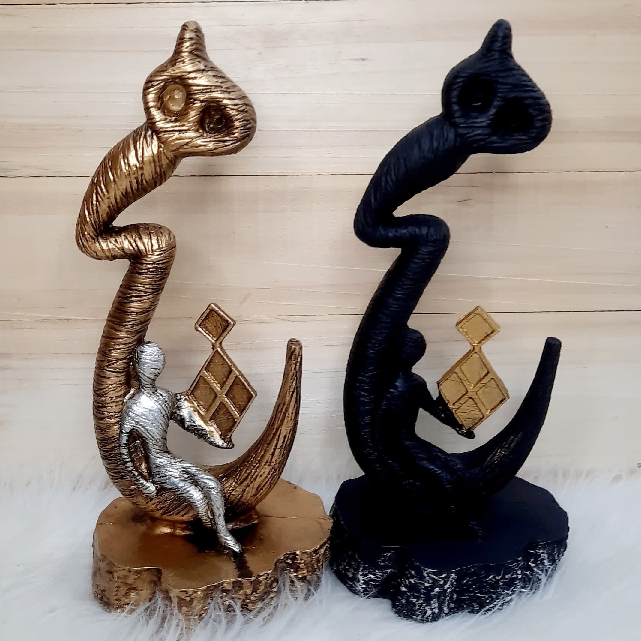 مجسمه هیچ دکوری رومیزی (پلی استر) طلایی مشکی ارتفاع 35 سانت