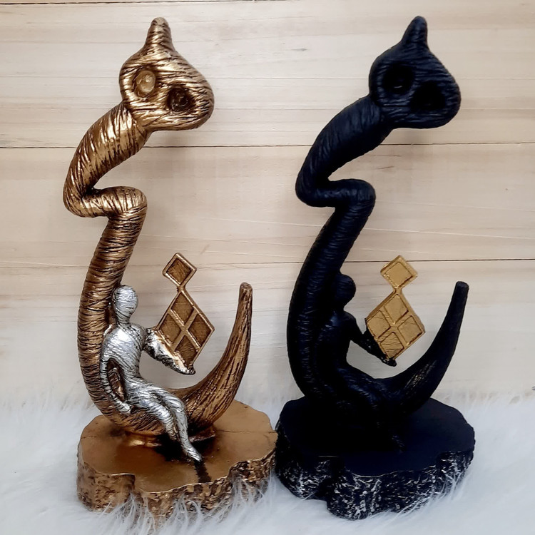 مجسمه هیچ دکوری رومیزی (پلی استر) طلایی مشکی ارتفاع 35 سانت